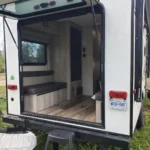 Escape trailer hatch